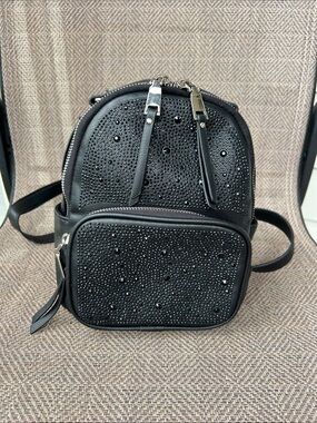 MADDEN NYC Black Studded Crystal Mini Dome shaped faux leather Backpack.
